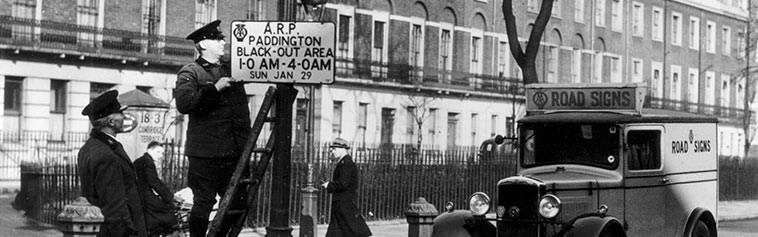 Putting up road signs - 1905