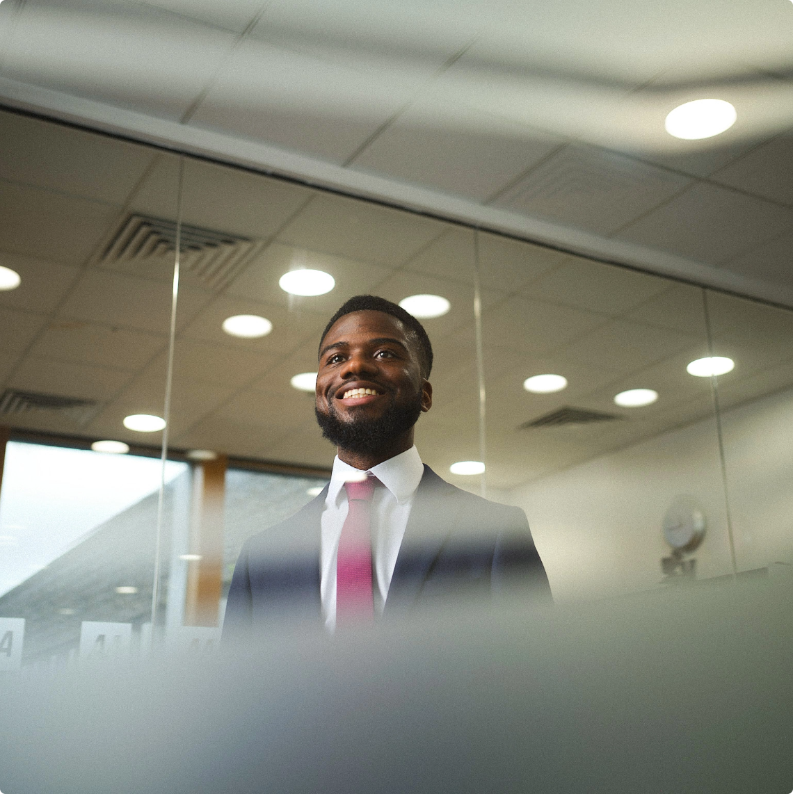 Man in coat smiling